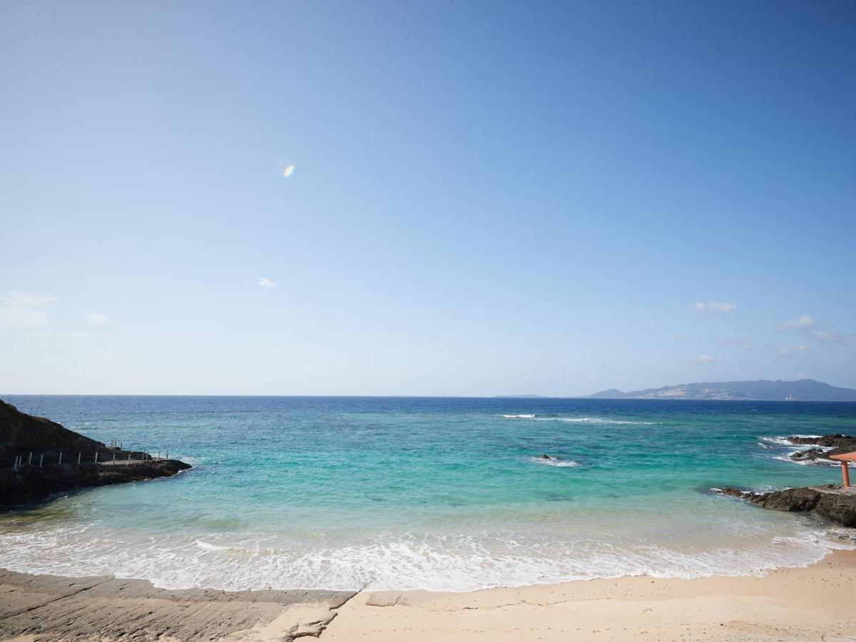 Hotel Miyuki Beach Onna Exteriör bild